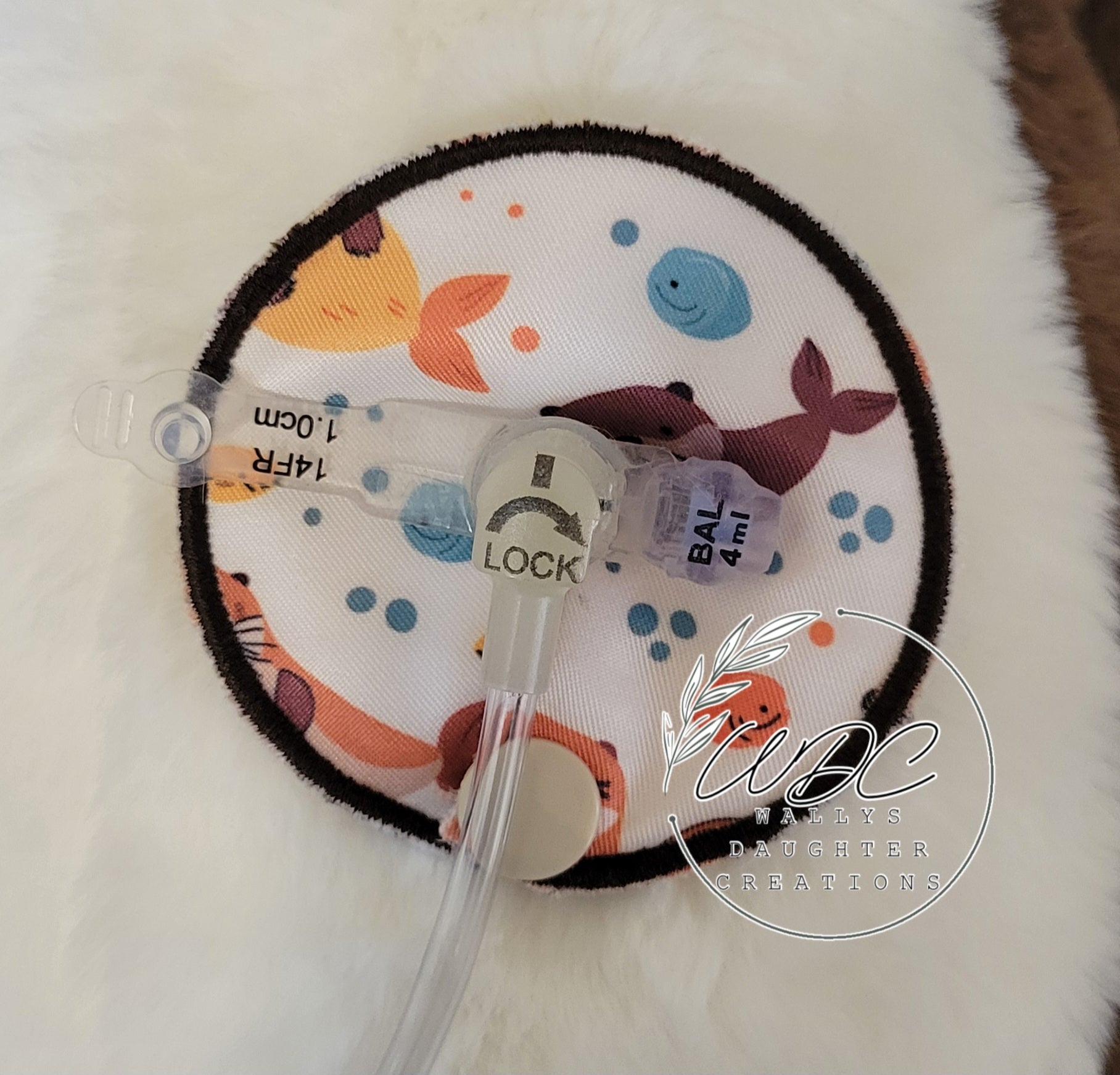 Mini gtube pad with otter character around a gtube button with extension connected