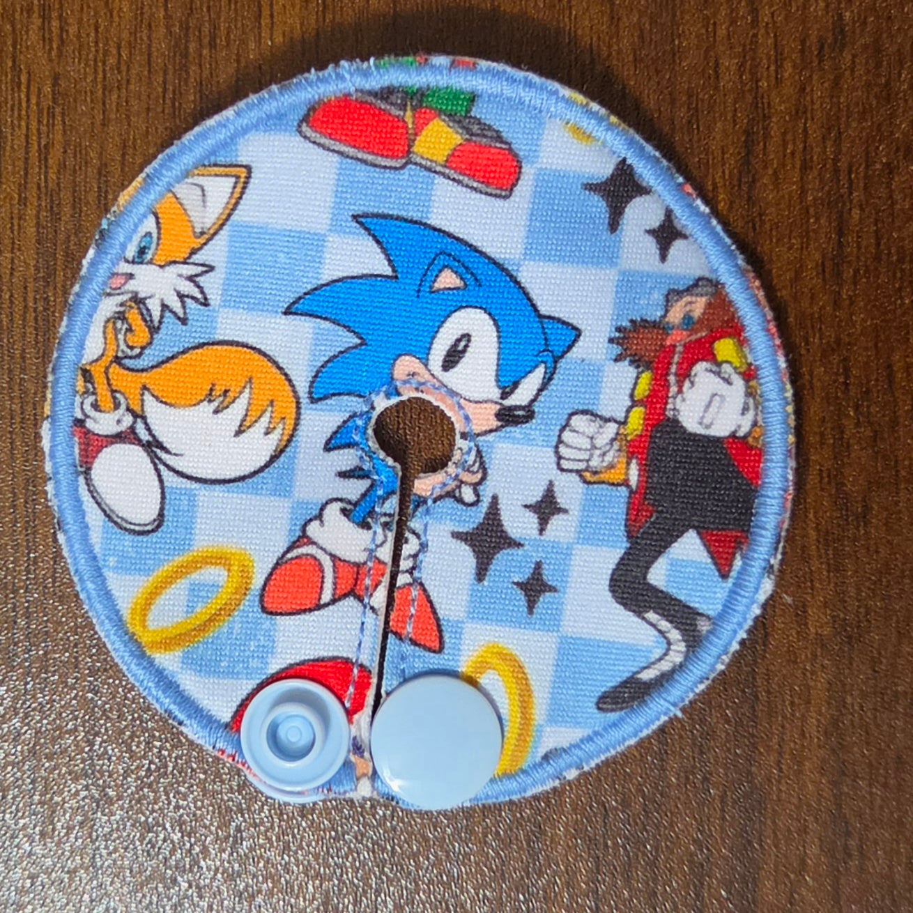 Mini gtube pad with blue hedgehog character and yellow fox