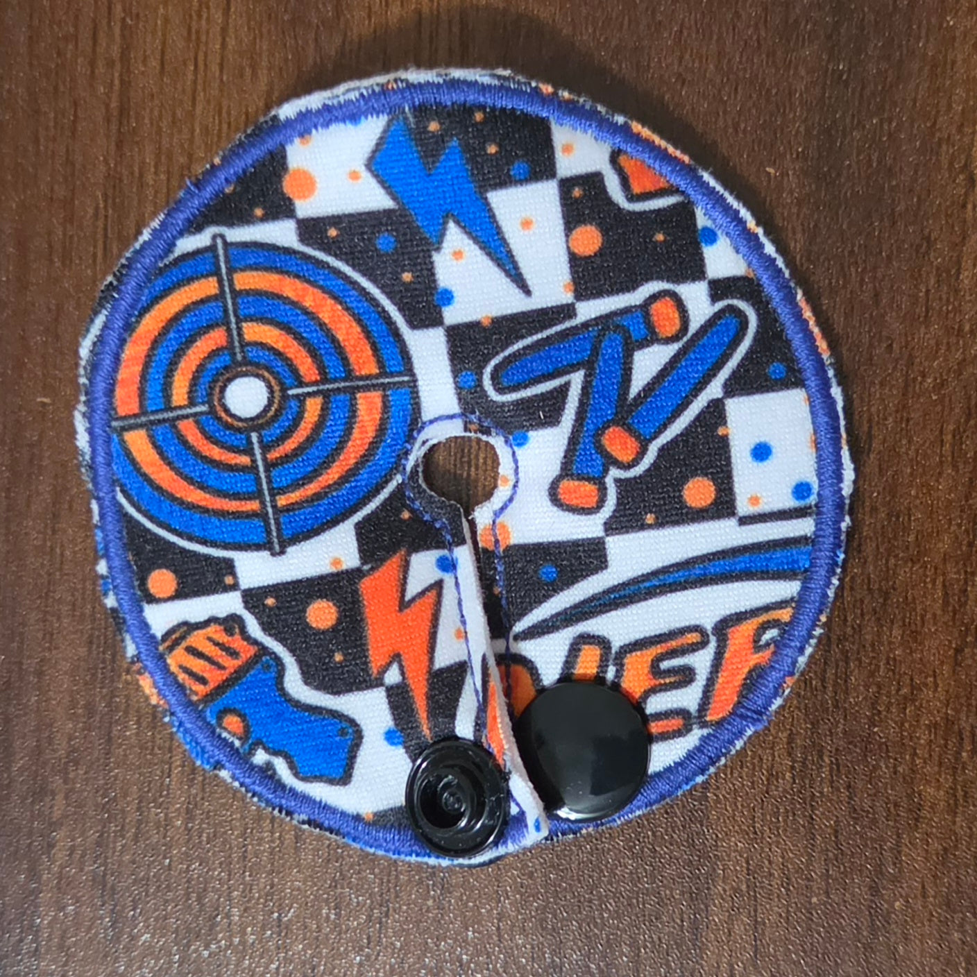 Mini gtube pad with blue and orange nerf items