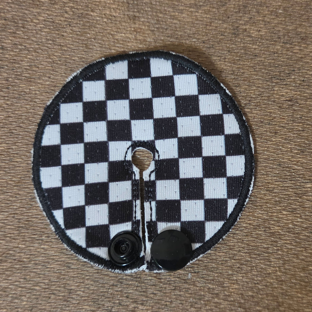 Mini gtube pad with black and white check pattern