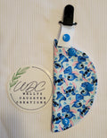 Clip on port cover in character print