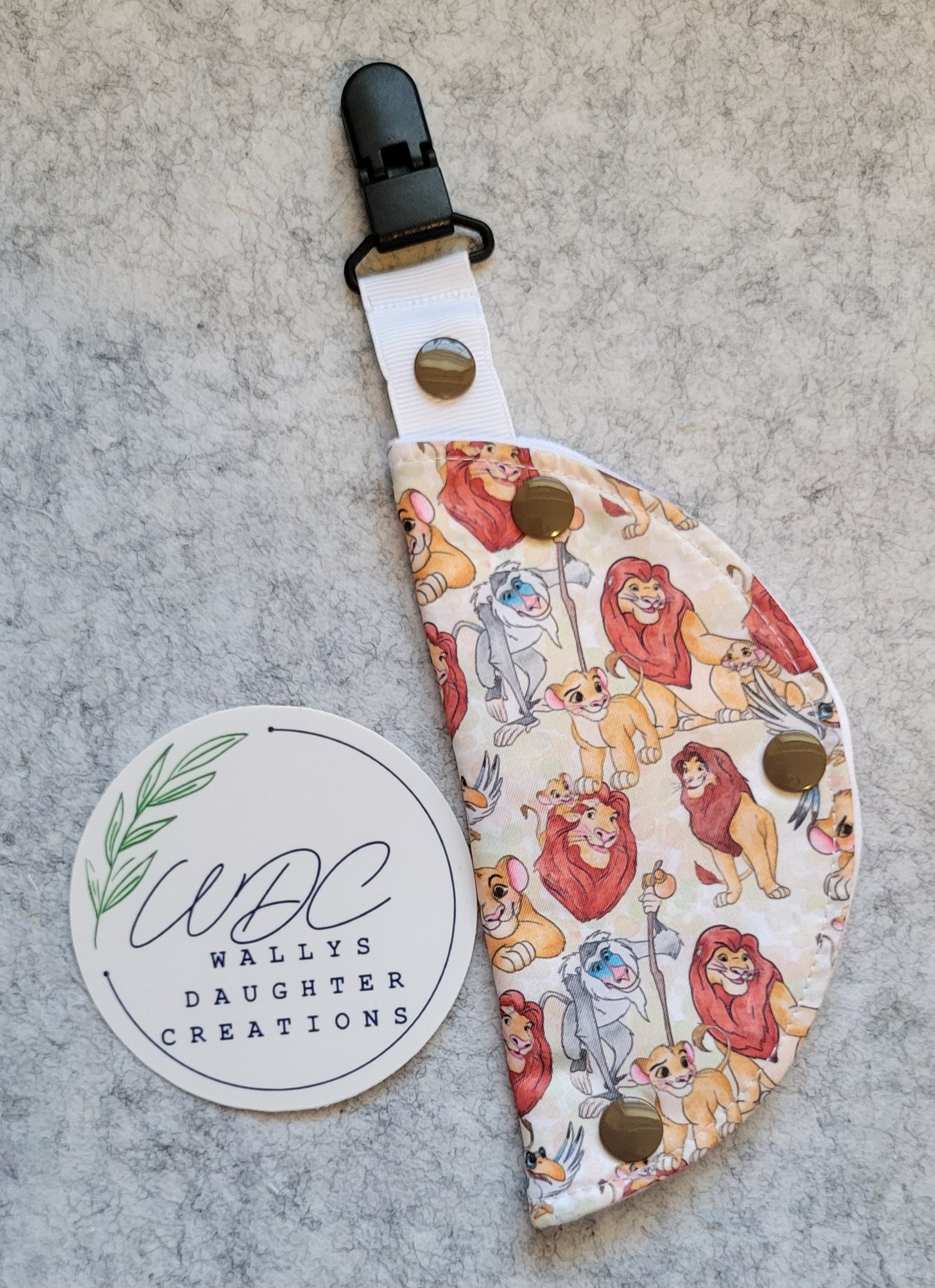 The King Clip on feeding tube port cover