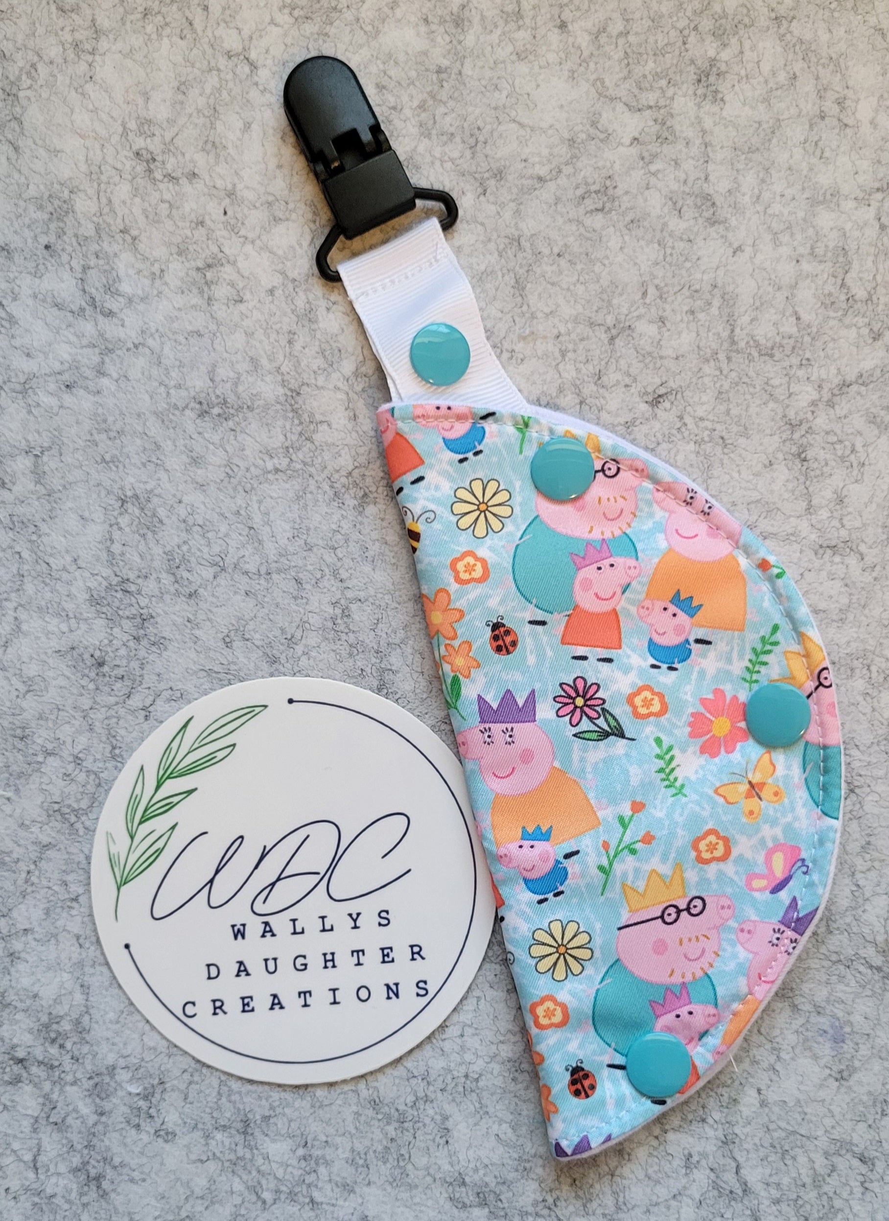 clip on port cover in a pig family character print