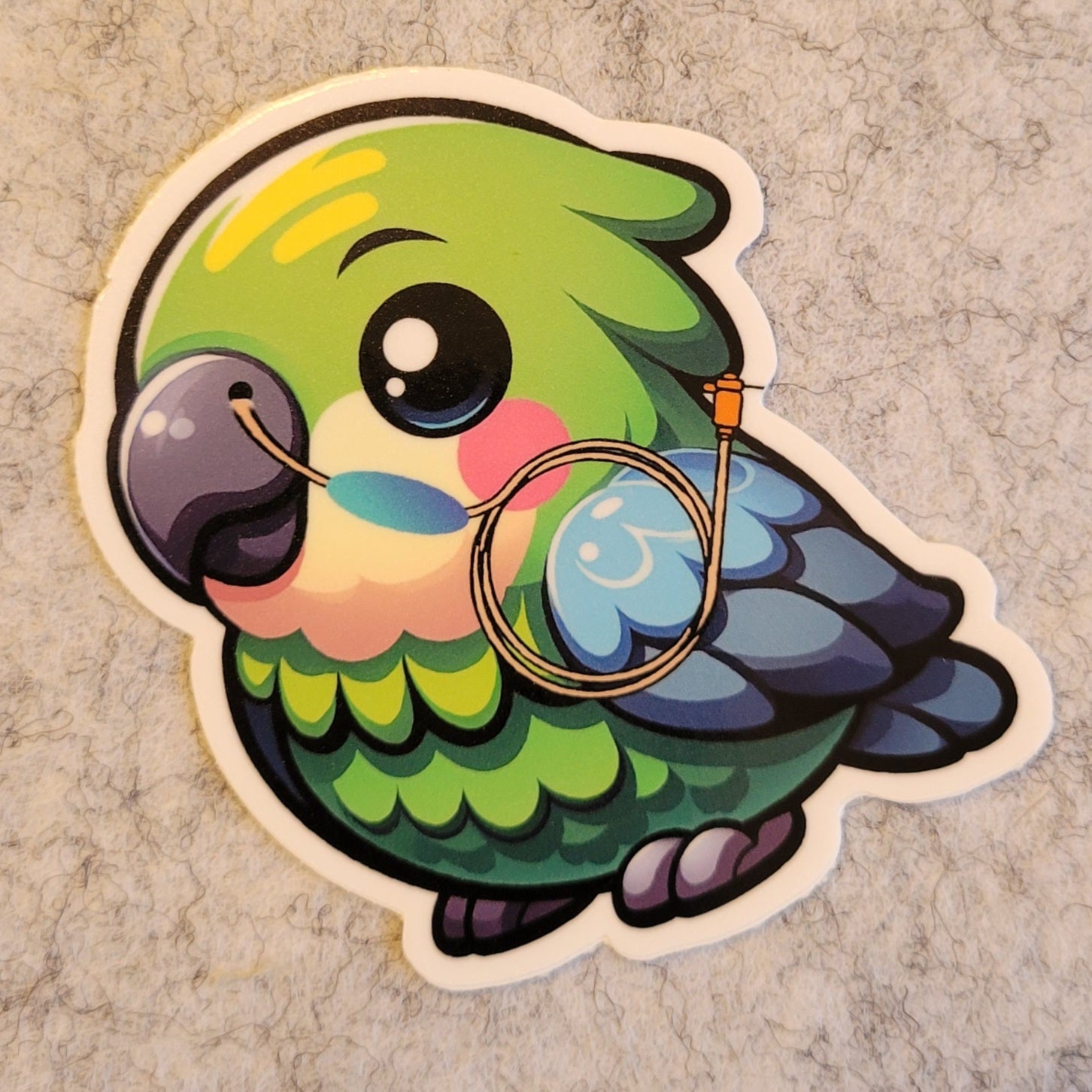 Cartoon parrot sticker featuring a NG tube in use on a textured background