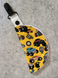 clip on port cover in monster truck theme print