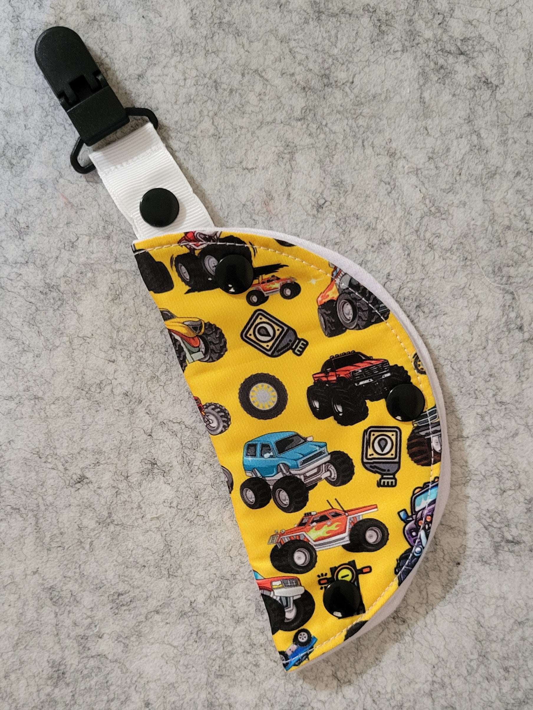 clip on port cover in monster truck theme print