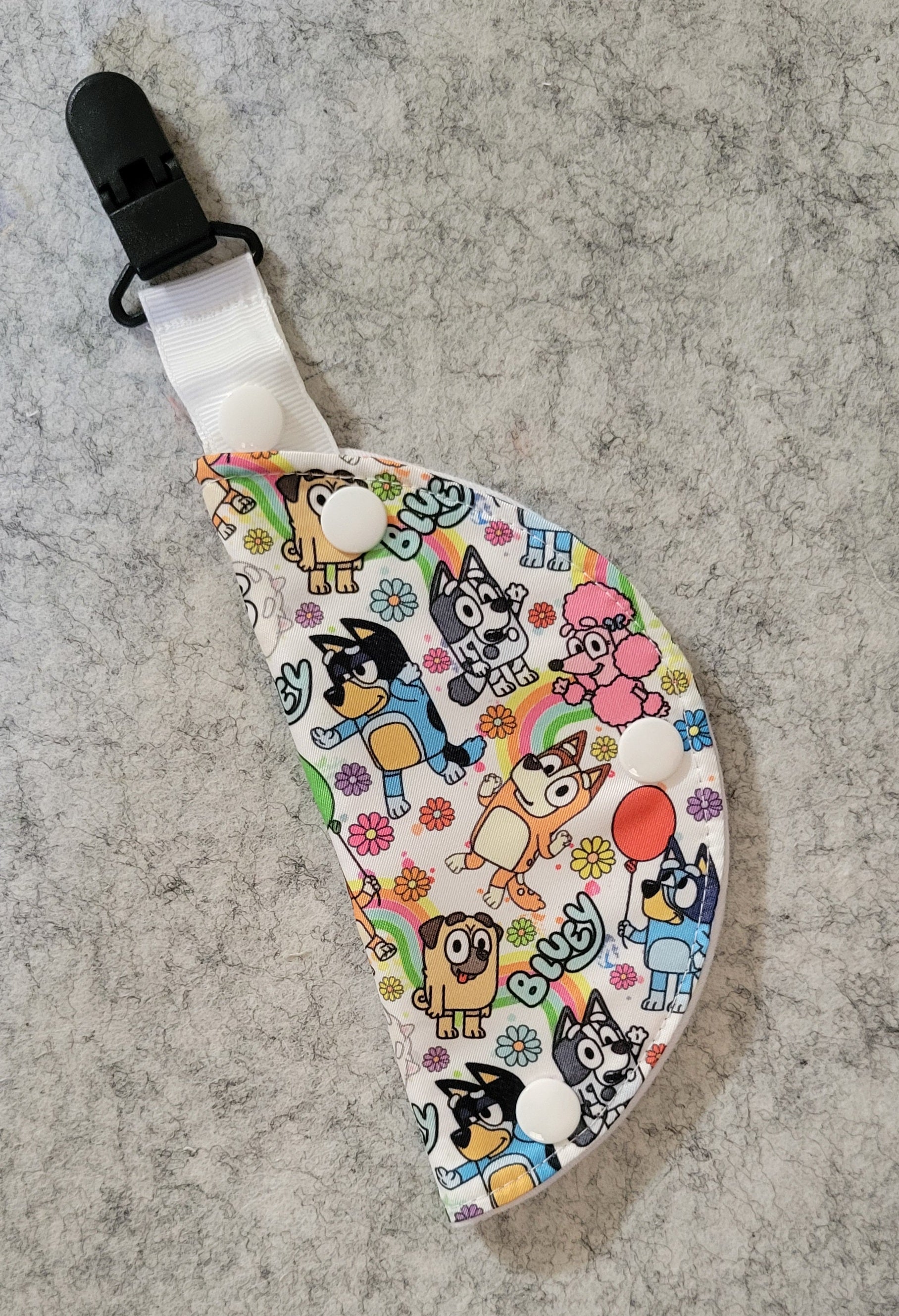 Clip on port cover with dog character print