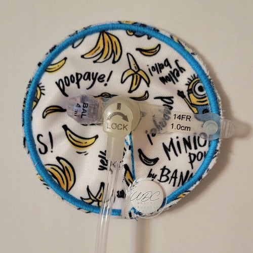 blue thread around gtube pad with characters and bananas