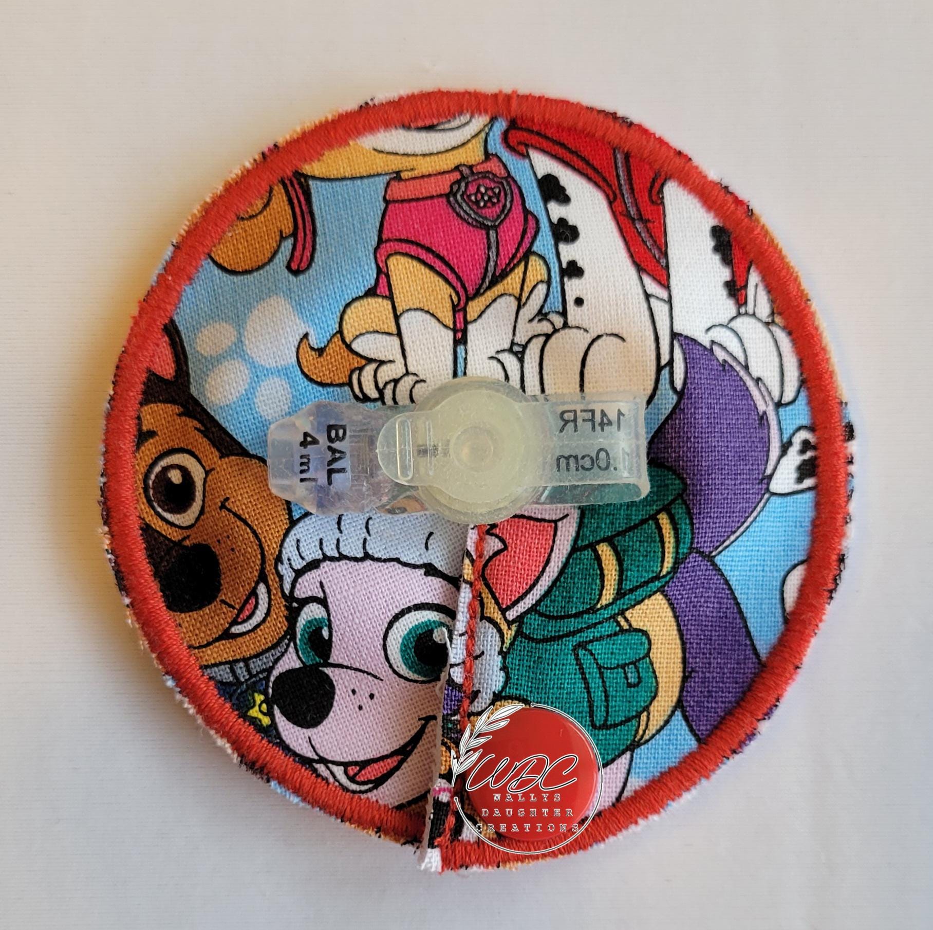 dog character gtube pad in red thread