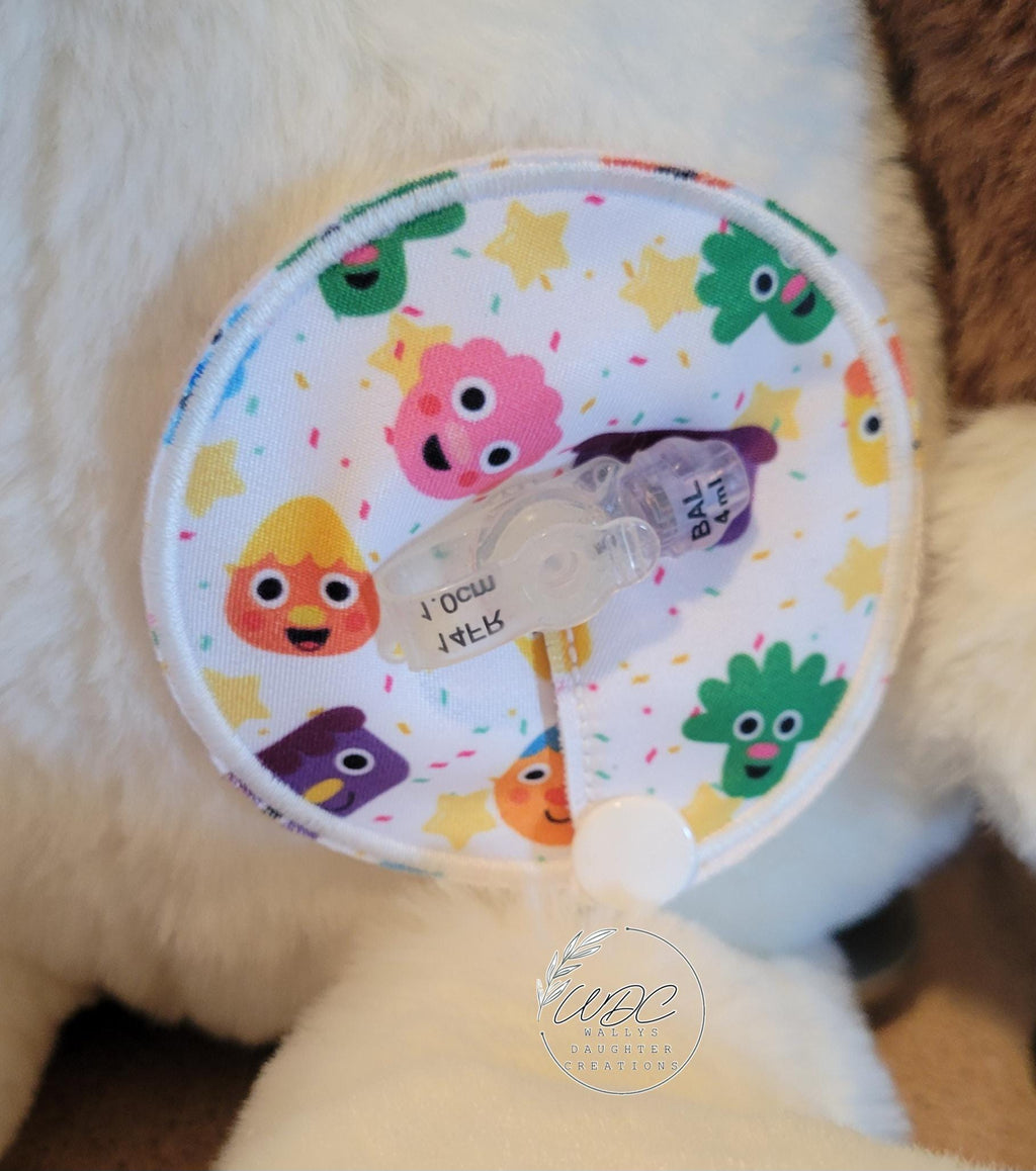 Character gtube pad on a stuffie with button