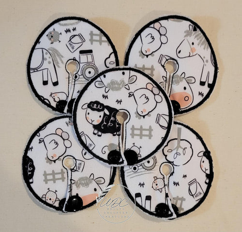gtube pad collage with black and white farm animals