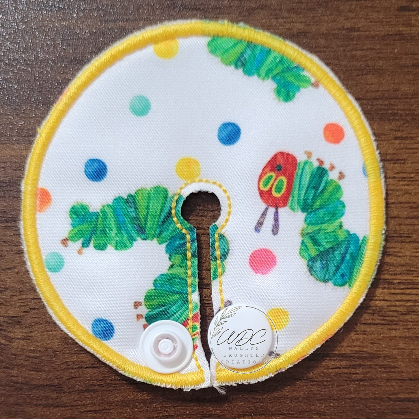 Gtube pad with caterpillar and polka dots