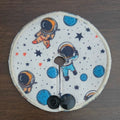 Astronauts on creme background with stars