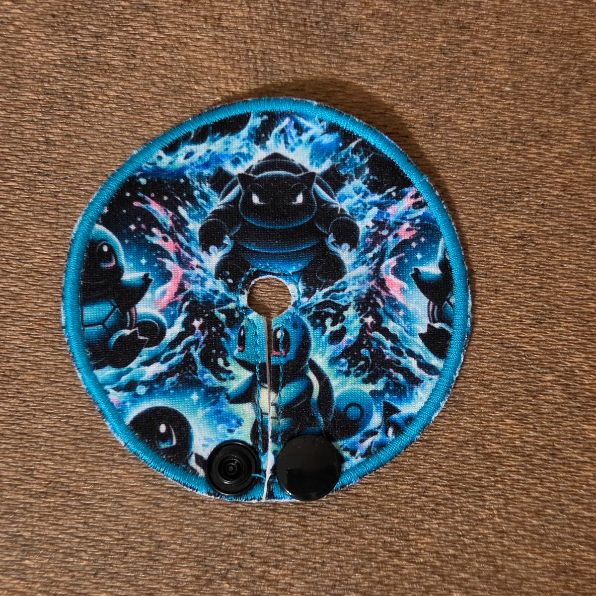 Squirt Character gtube pad on neon blue and black 