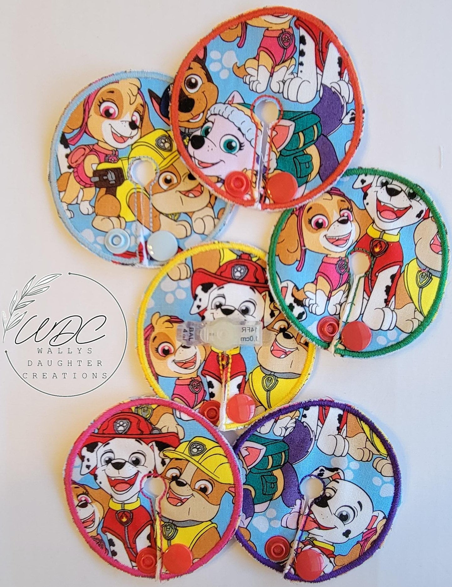 collage of different colored gtube pads with dog characters