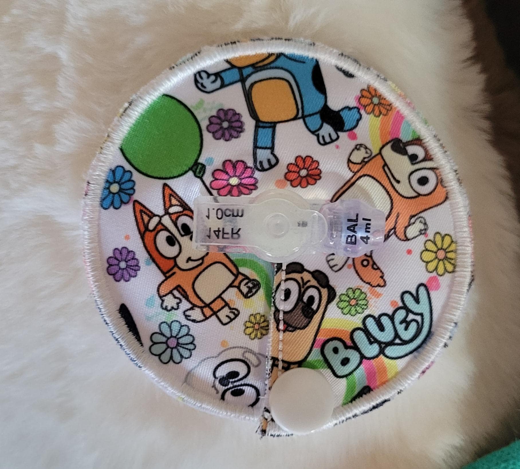 Gtube pad with character print on a mini one button