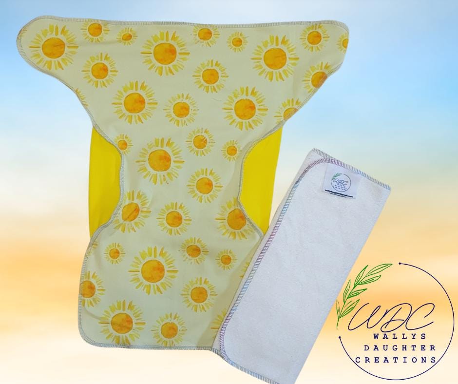 Reusable diaper with sunflower pattern on a gradient background