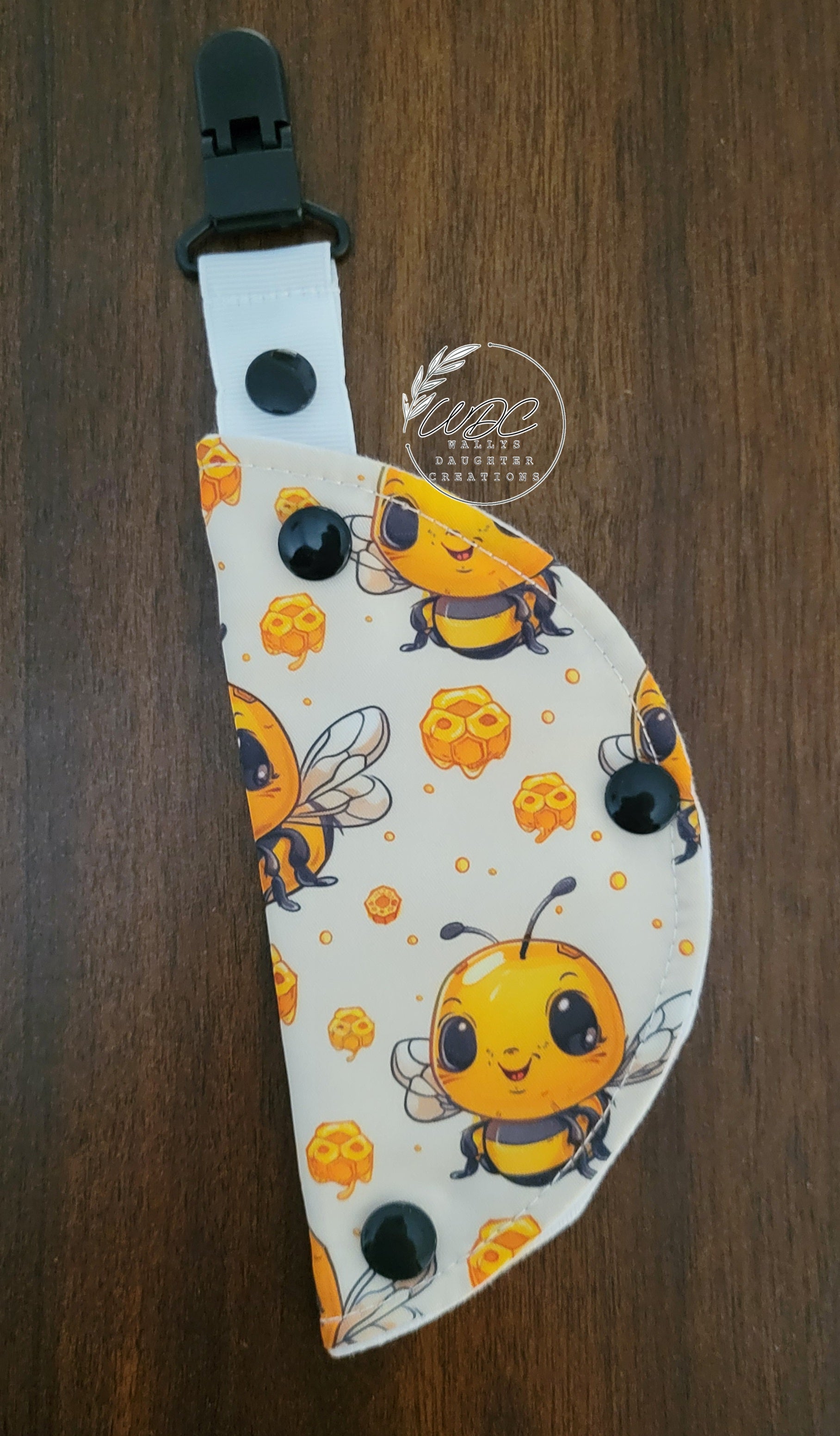 Clip on port cover with baby bee character