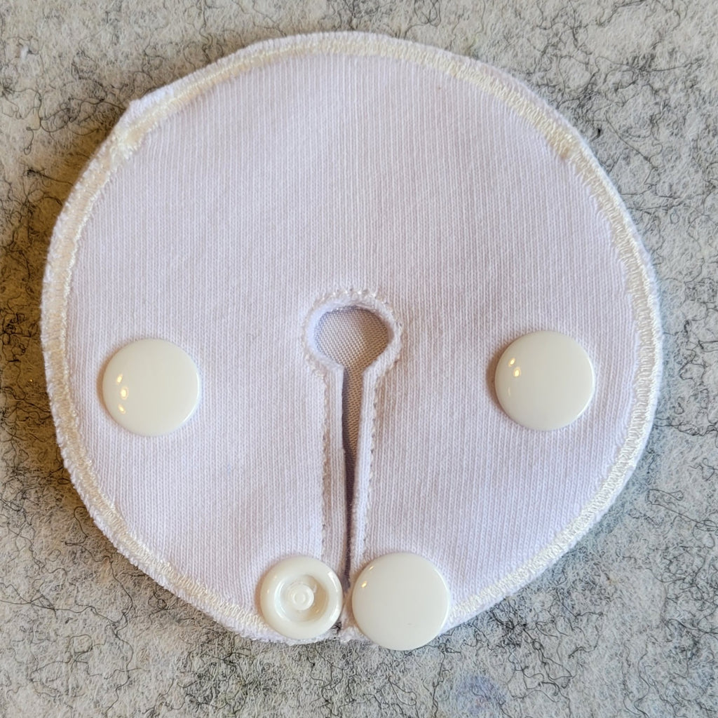 Back view of snap down pad
