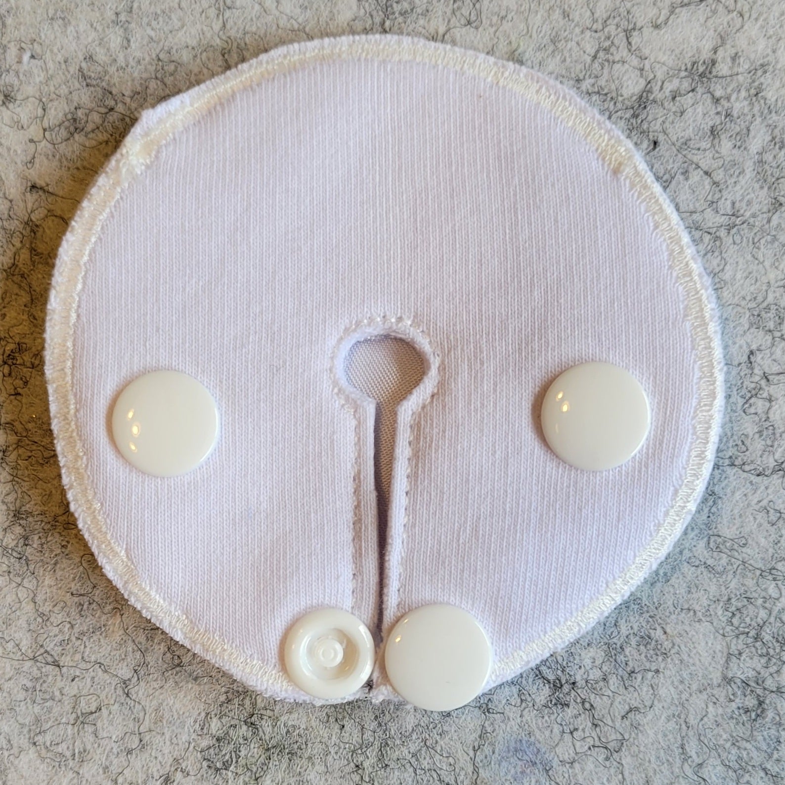 Back view of snap down pad