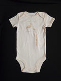Gtube adapted bodysuit on cream background with Crane and baby wording says happiest with you