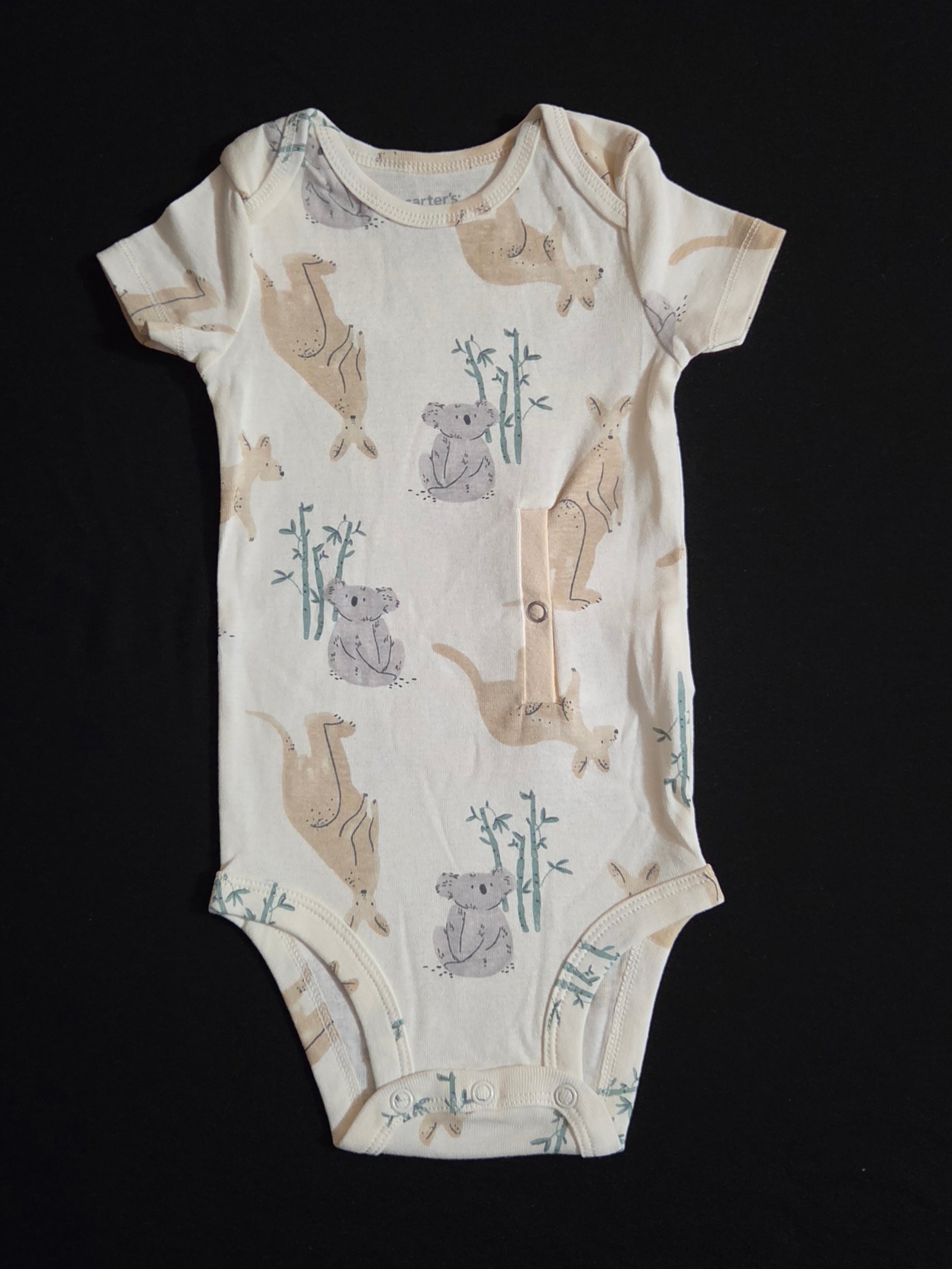 Gtube adapted bodysuit  on cream background with kangaroos and koalas with bamboo