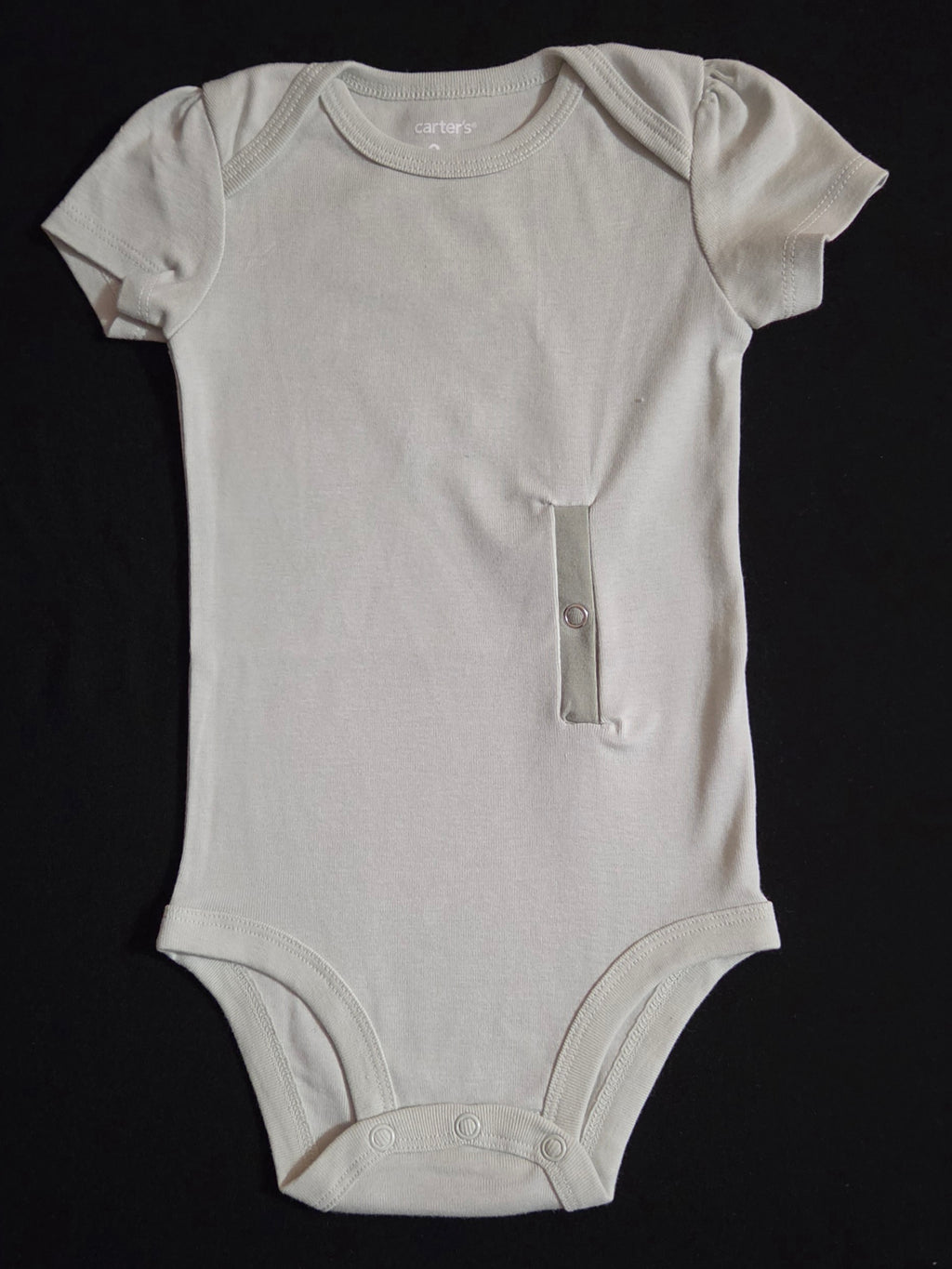 Sage colored bodysuit adapted for gtube access with ruffled sleeve