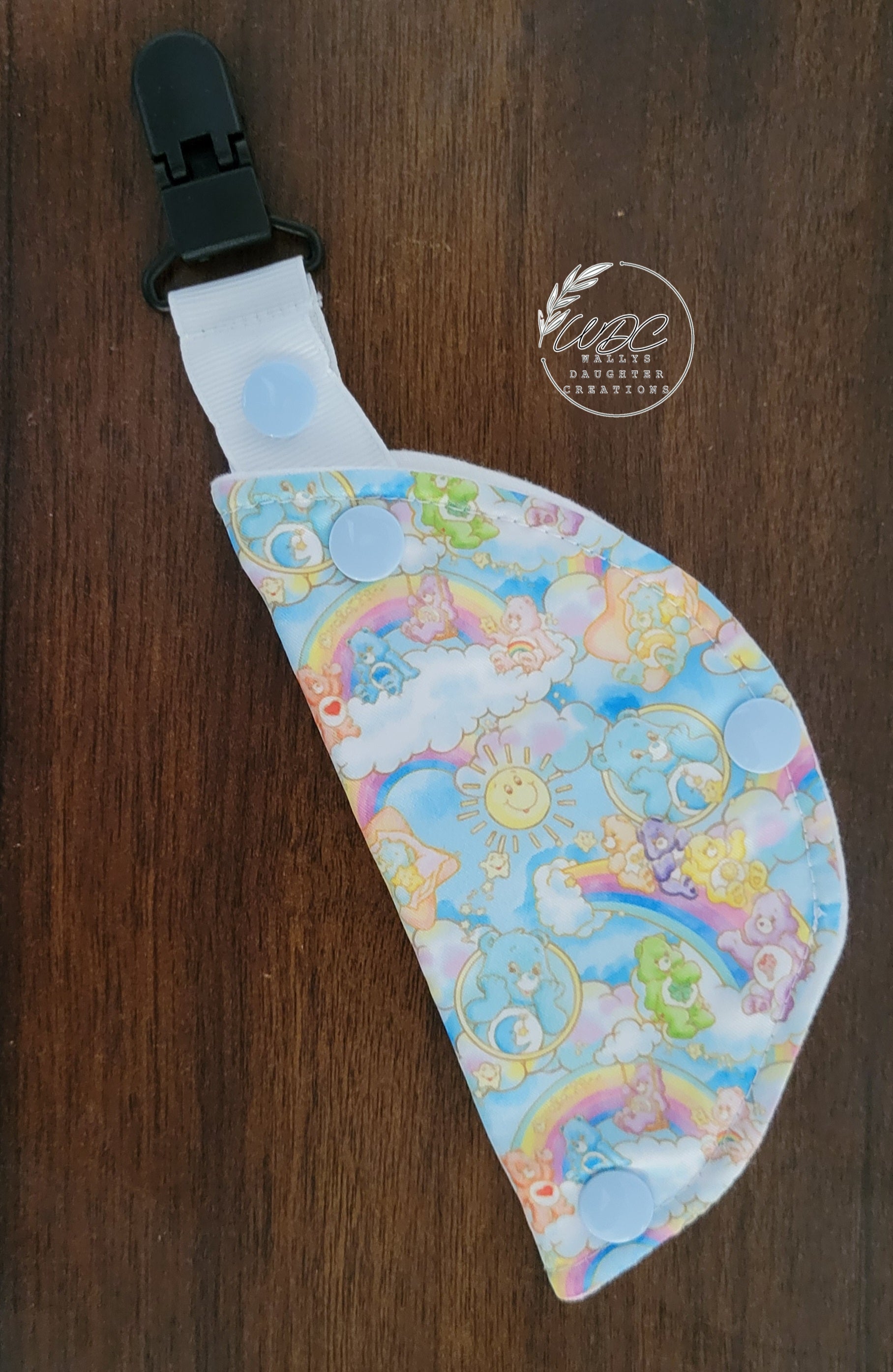 Clip on Port cover with blue caring bears and rainbows 