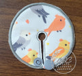 gtube pad with different colored cockatiel birds on white background