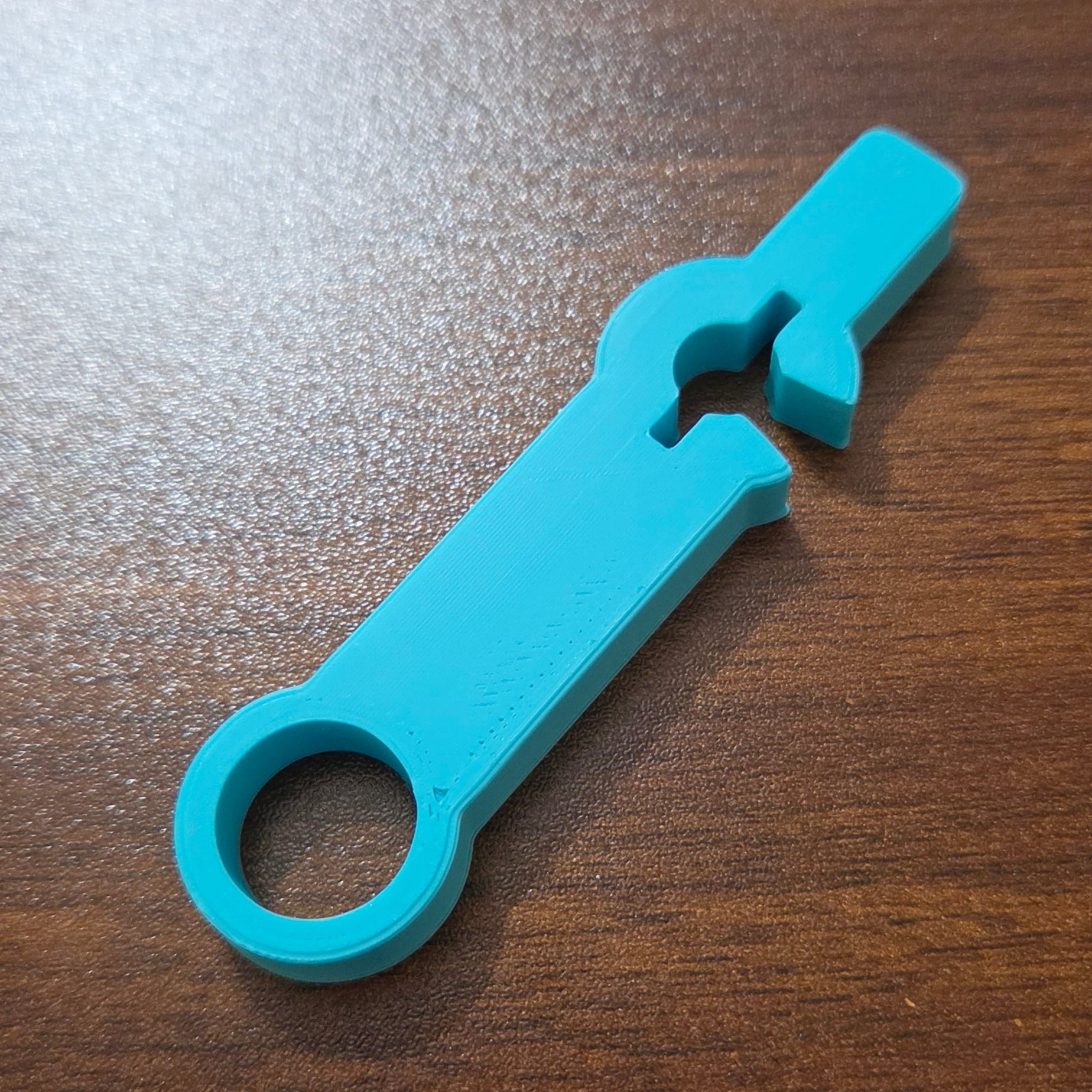 Teal Enfit Wrench