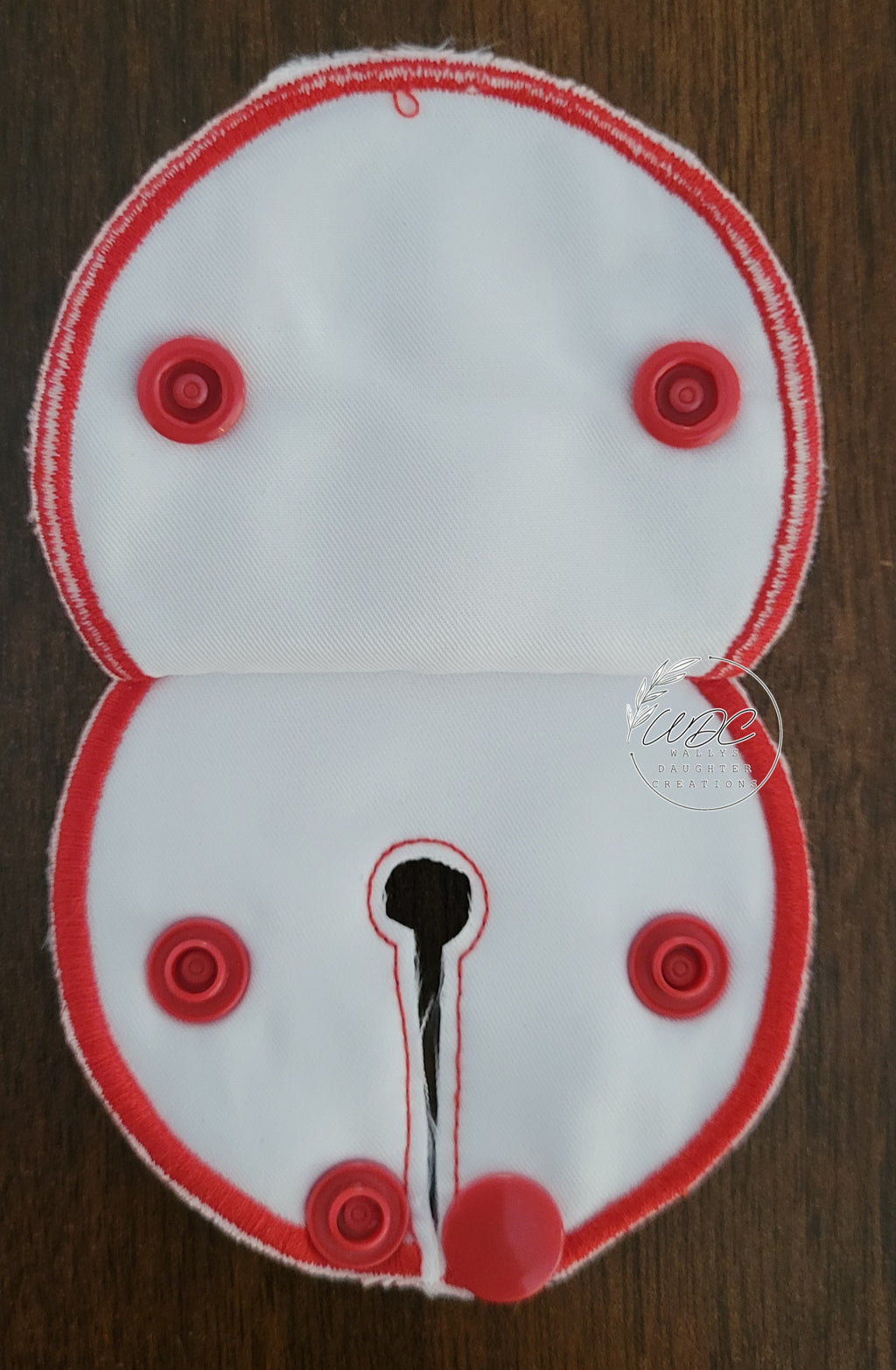inside view of snap down pad with red edging