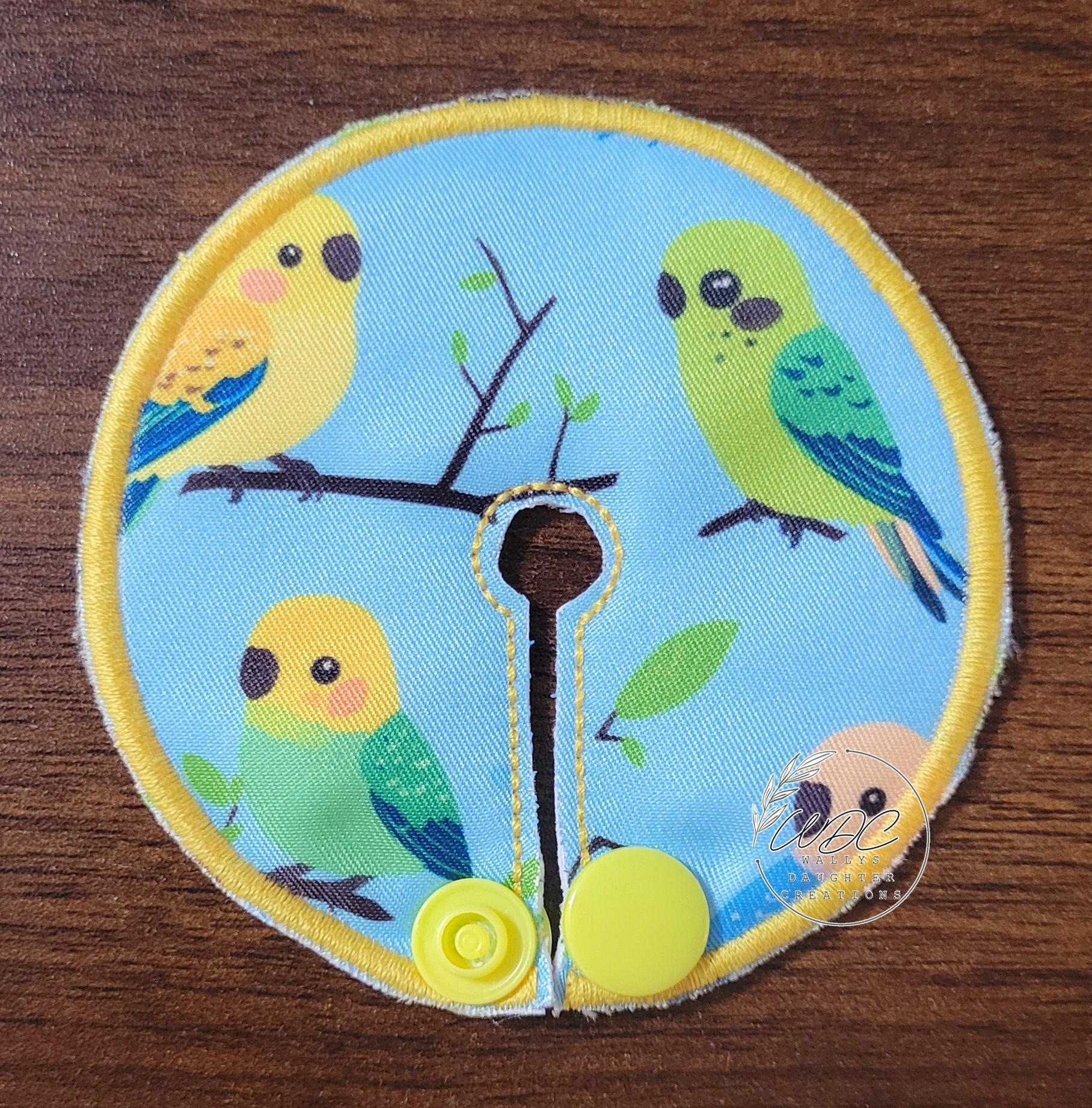 Gtube pad with Parrot characters on a light blue background