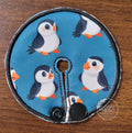 Gtube pad with penguin characters on blue background