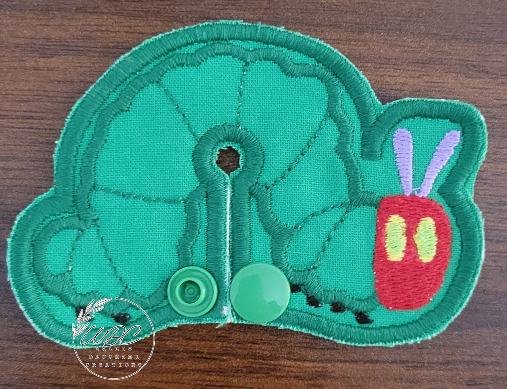 Gtube pad in a caterpillar shape