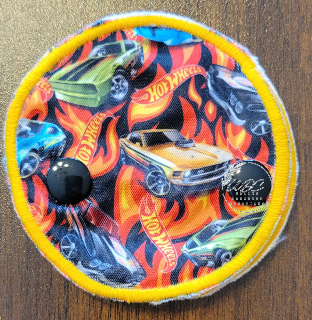 Snap down gtube pad with hotrod cars and flames