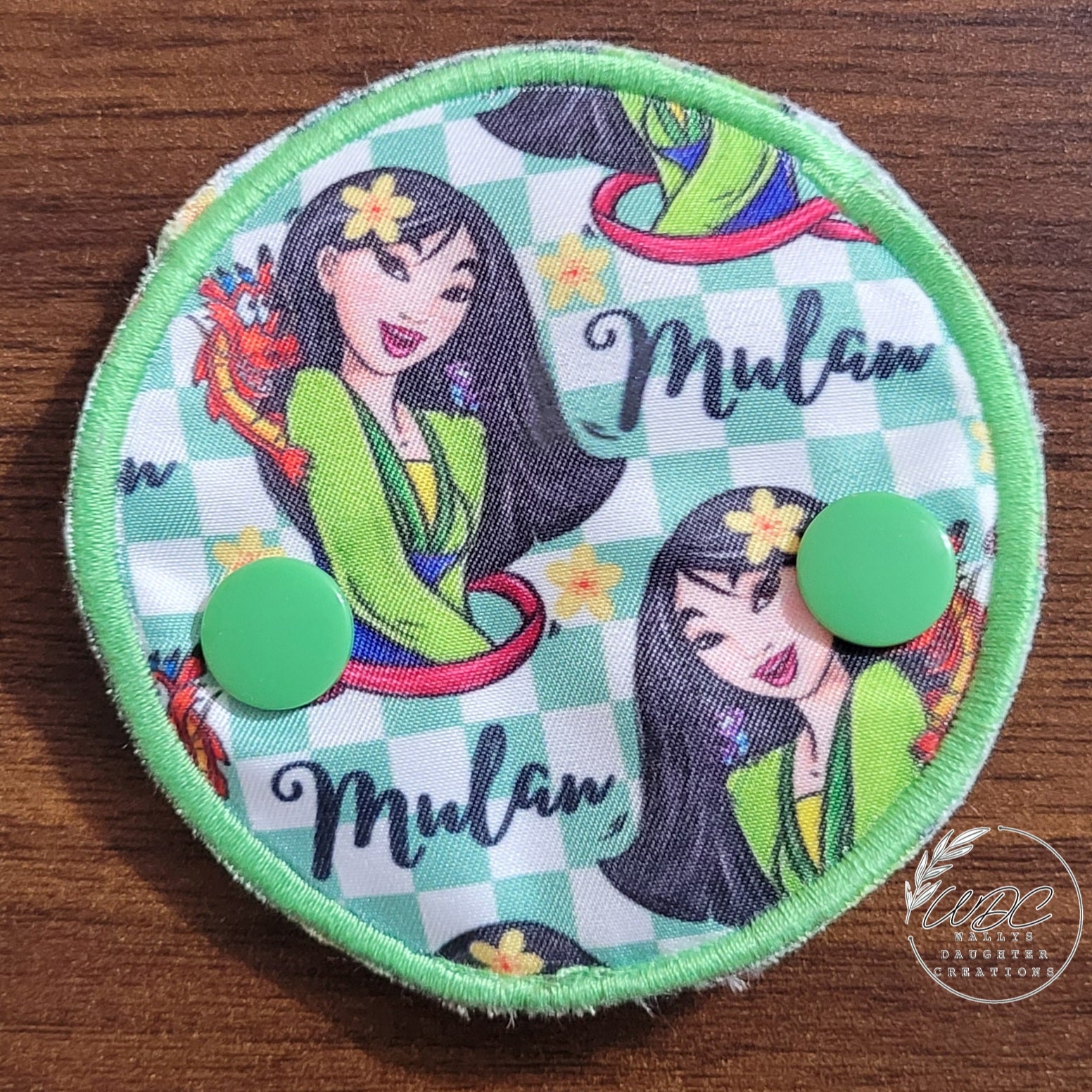 Snap down covered pad in Mulan character