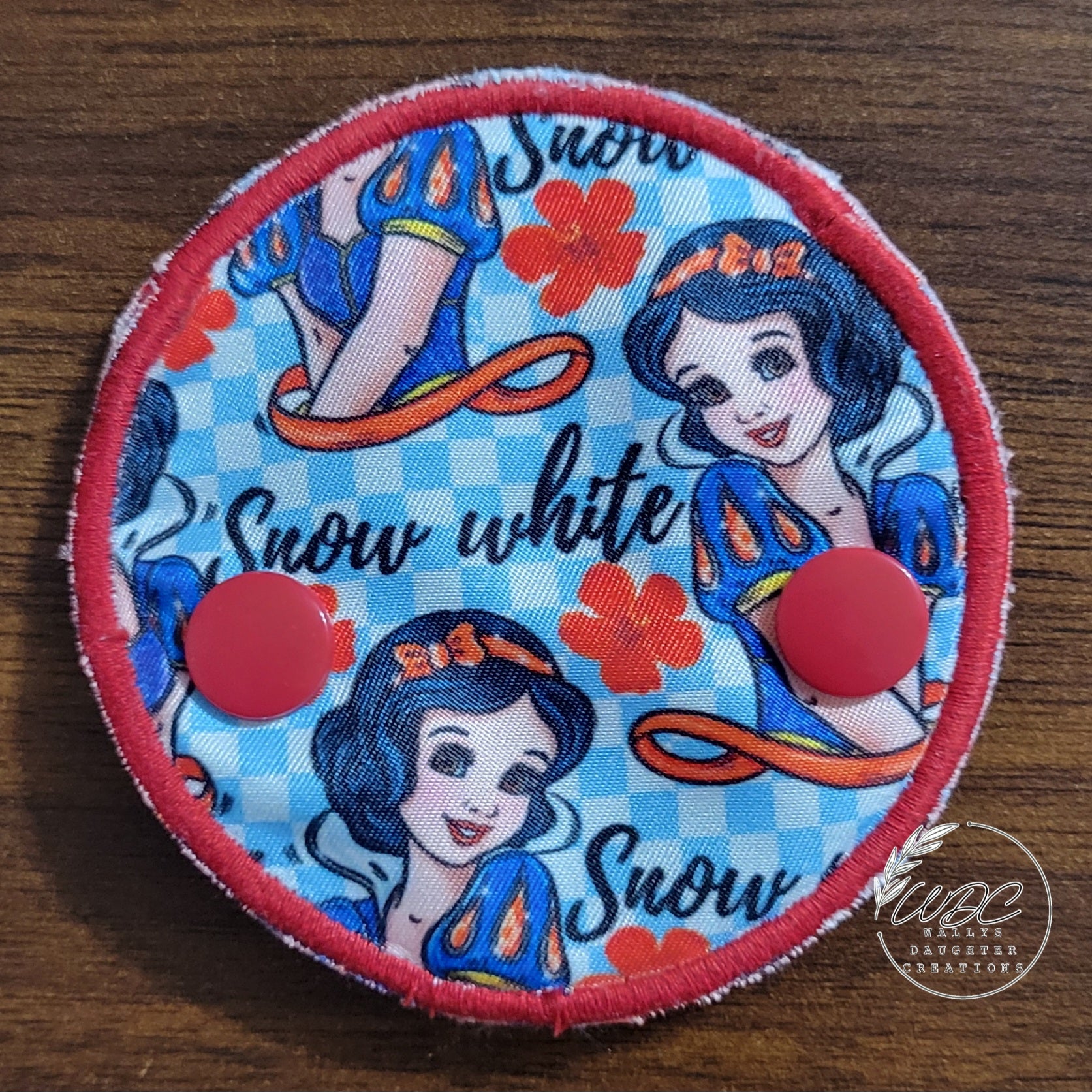 Snap down covered pad in snow white character