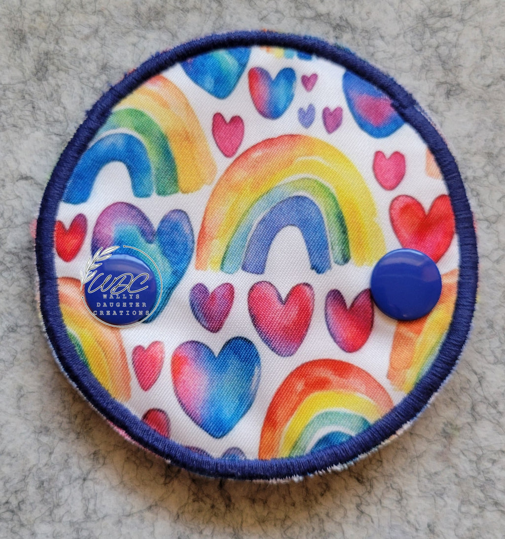 snap down gtube pad with watercolor hearts and rainbows