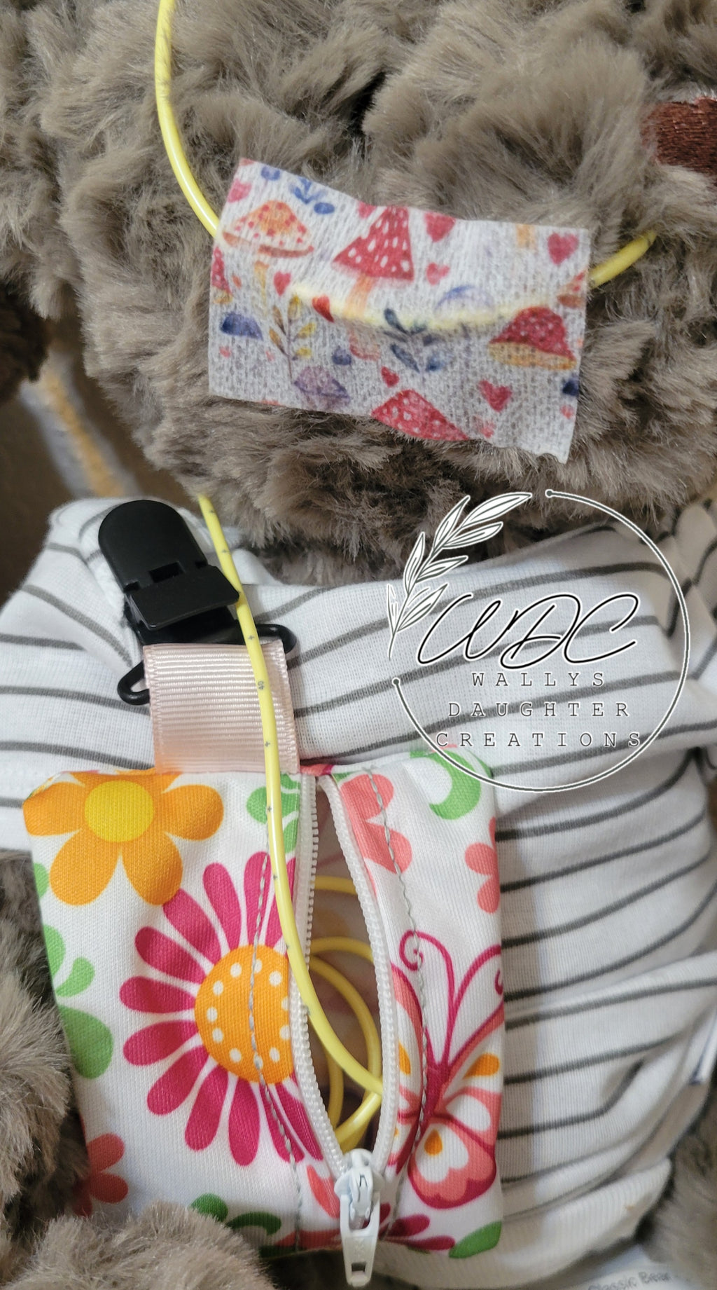 Stuffie with NG tube and clip on zip pouch