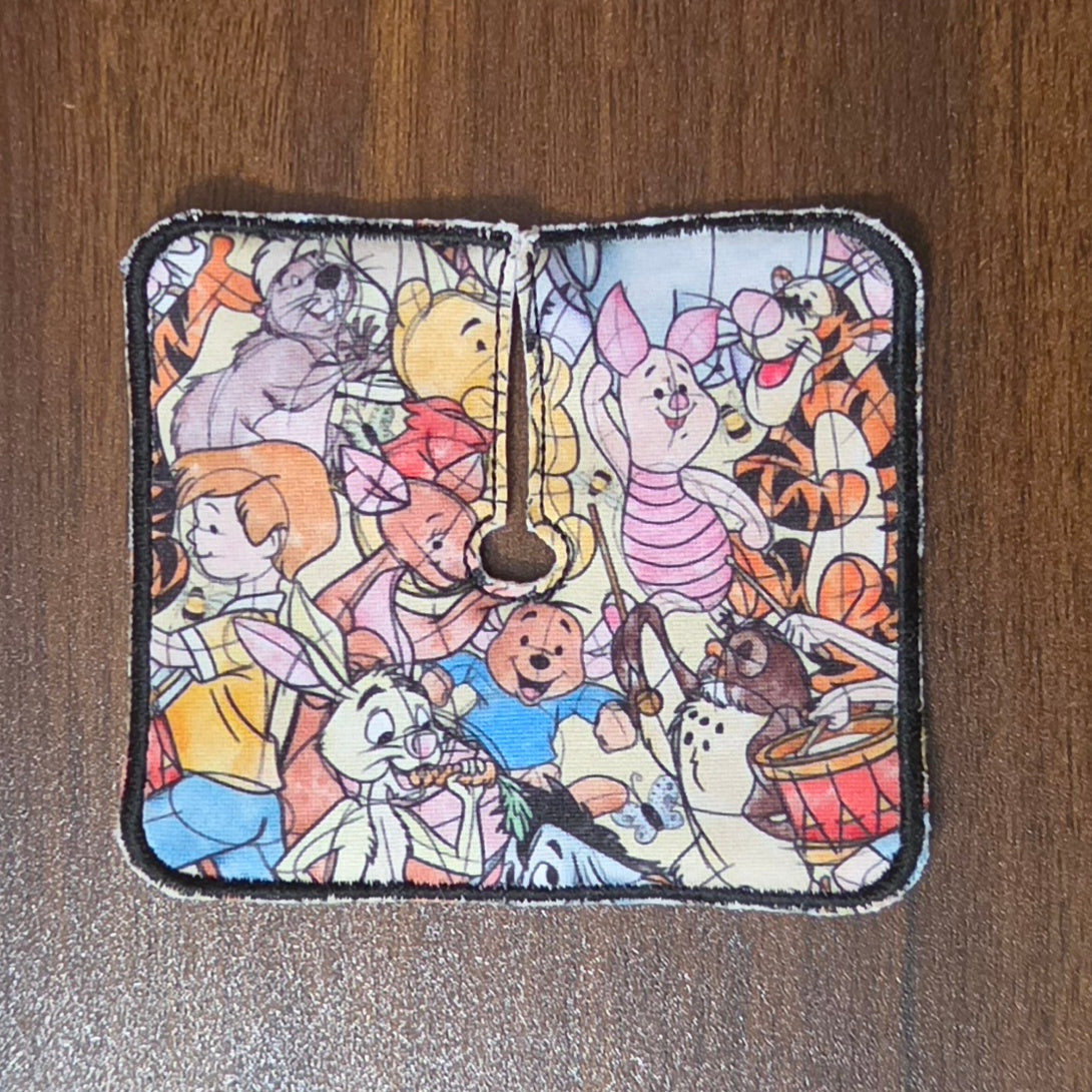 Trach pad with a stack collage of characters