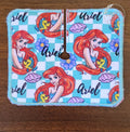 Trach pad with mermaid character and fish