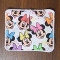 Colorful bows on a mouse character trach pad