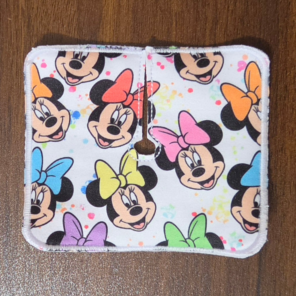 Colorful bows on a mouse character trach pad