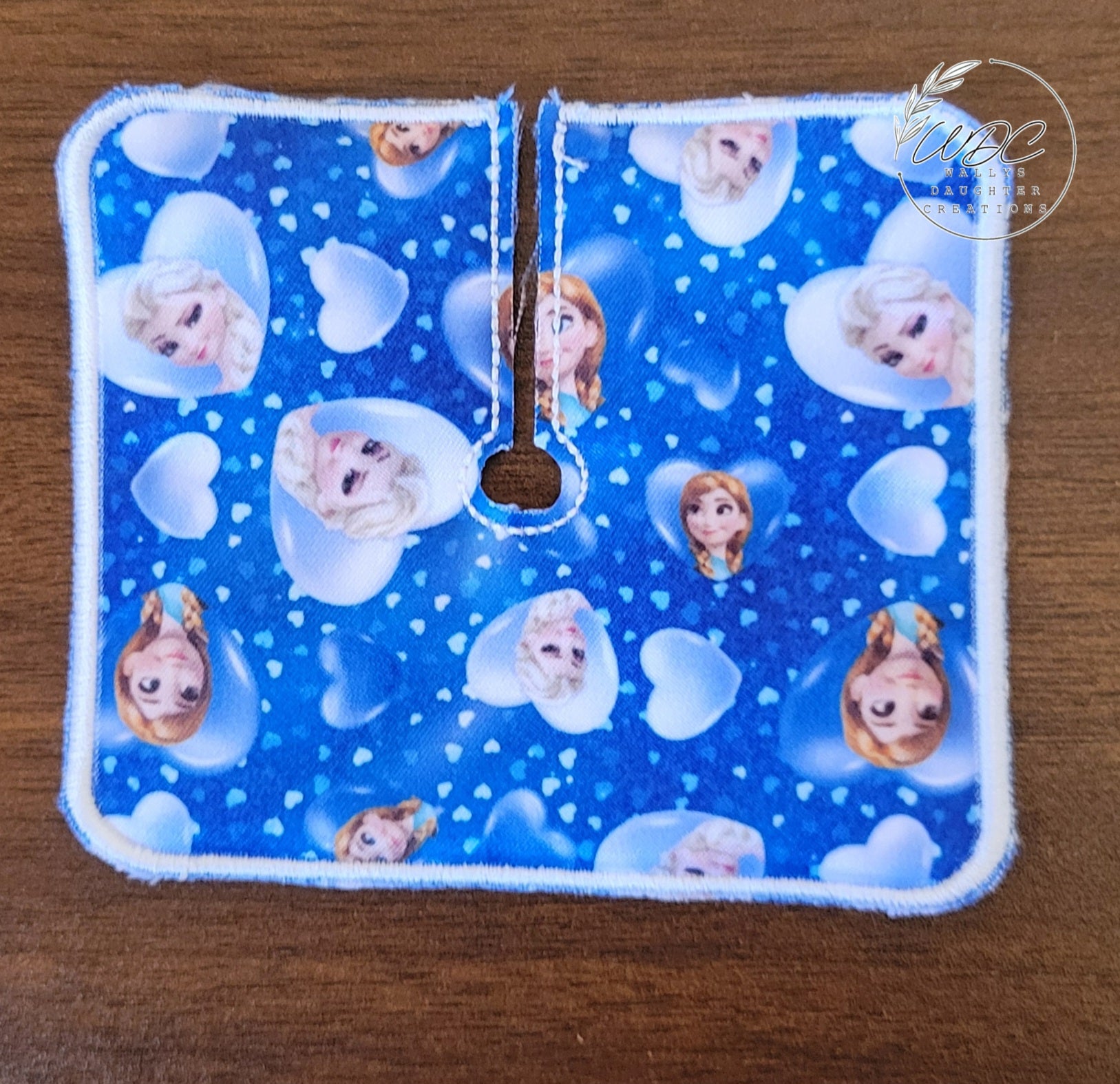 Trach Pad with Ice sisters characters with white hearts on blue background