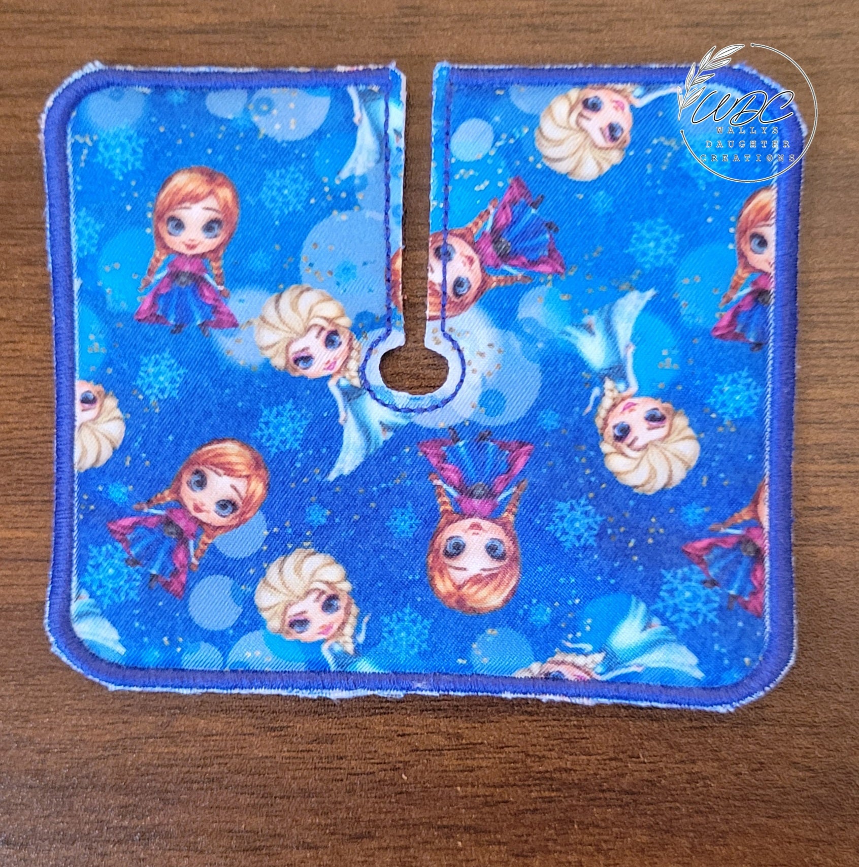 Trach Pad with Ice sisters characters on blue background