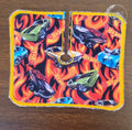 Trach Pad in a car print with flames in background