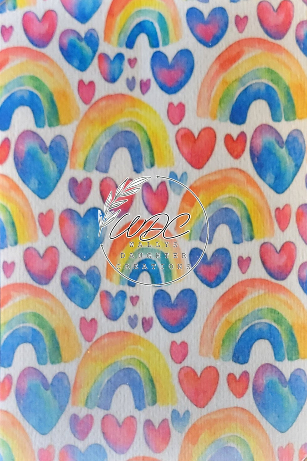 Sublimated Hypafix Tape with hearts and rainbows on white background