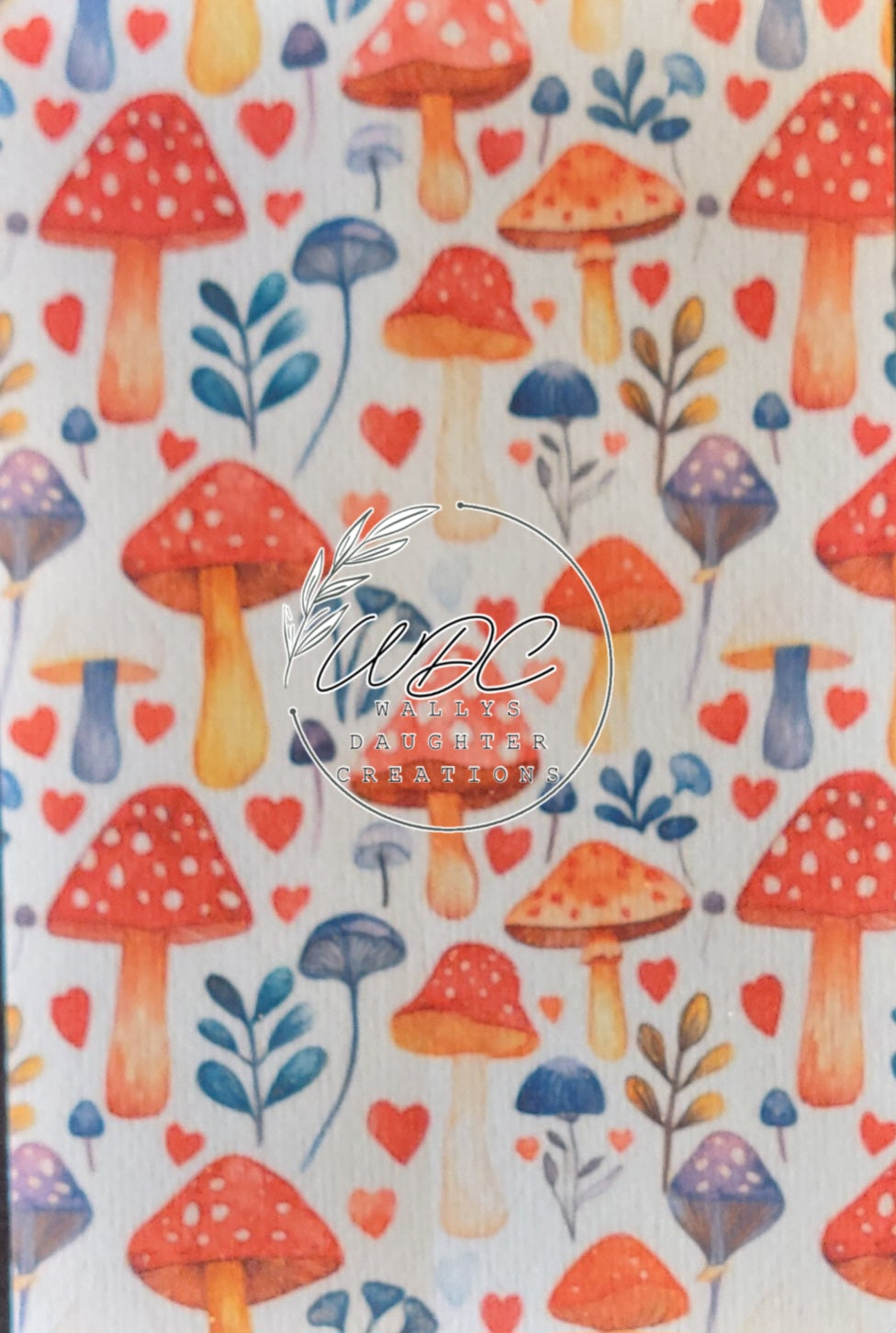 Sublimated Hypafix tape with red and blue mushrooms on white background