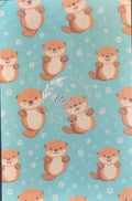 Sublimated Hypafix tape with baby otters on a teal blue background