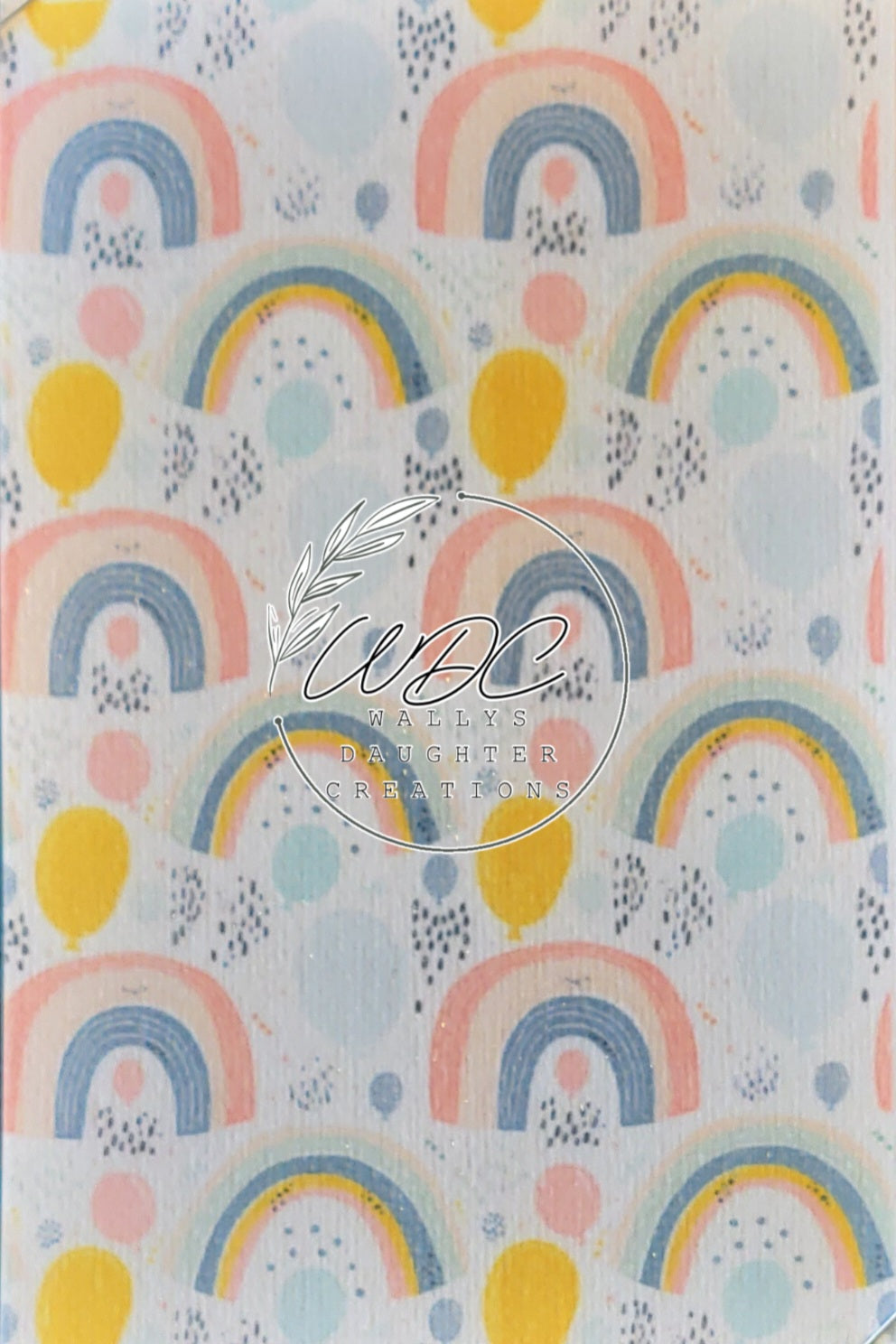 Sublimated hypafix tape with pastel rainbows and balloons on a white background